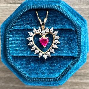 1.45 Grams 10K Gold Heart Pendant with Diamond And Ruby Accents